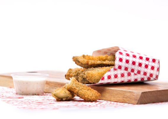 5 crunchy dill pickle spears are battered and deep fried to a golden brown.