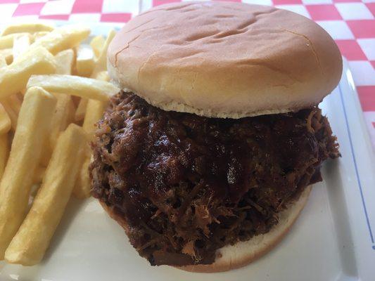 The Scout! Delicious BBQ sandwich with your choice of our tender brisket, pork or chicken!