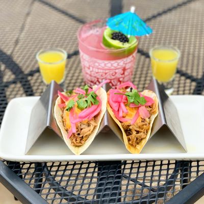 Tiki Tuesday. $6 cocktail $2 rum runner shots $2 tacos