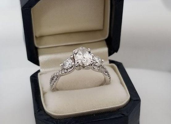 Oval center diamond engagement ring custom made in 14kt white gold