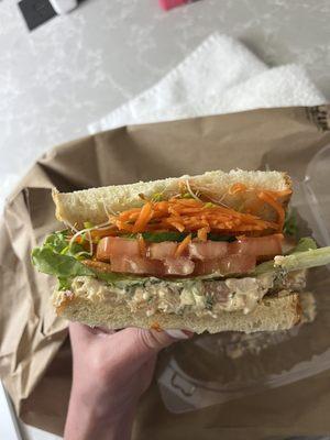 Shrimp salad on sourdough (mainly just the toppings and very little shrimp salad)