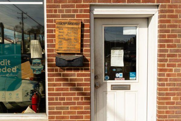 Here's our front door where you'll enter our shop! Look for this door the next time you stop by.