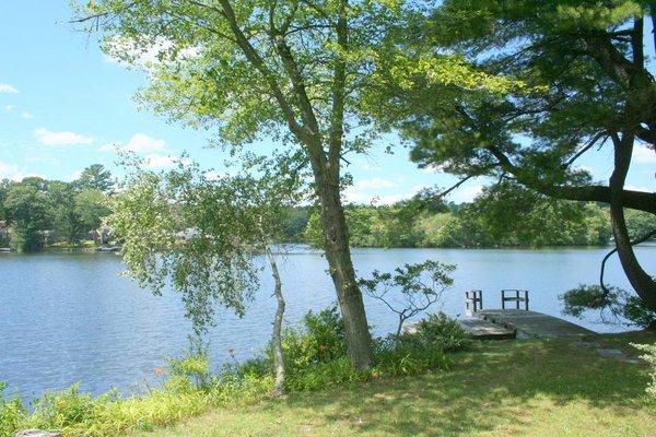 Stunning Lake Front Views on an Oversized .55 Acre Lot! 4 Bedroom, 2 1/2 Baths, 2 Car Garage, Workshop with Lake View, Large ...