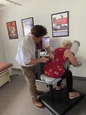 Dr. Schulz adjusting with a ProAdjuster. This a machine that we use when a traditional adjustment cannot or should not be used.