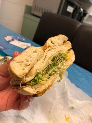 Chicken combo sandwich on a jalapeño cheese bagel. Swapped out tomatoes for yellow peppers  comes with chips and fountain drink.