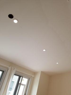 Recessed light installation.