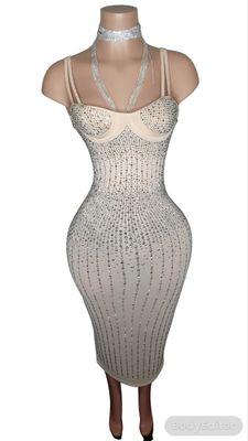 Rhinestone dress great for birthday, holiday, major events. Sure to stand out and shine. See through with inner lining.