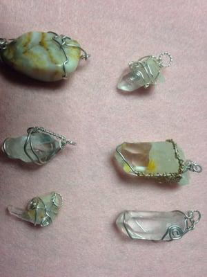 Wire wrapped crystals from Arkansas we mined and one prairie agate.