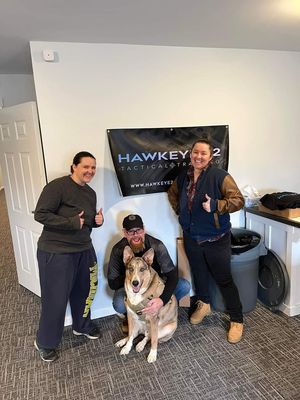 Me and my wife with out instructor and Hawkeye 22's official mascot