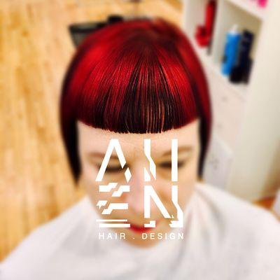 Precision cut detail with red and black block color by Hair Designer Allen Addington