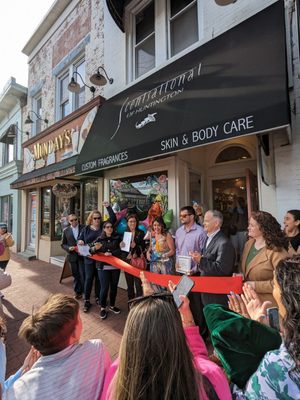 Ribbon cutting when Scentsational was purchased by long time employee