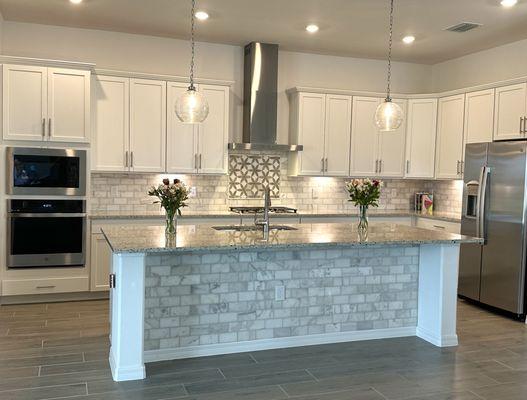 kitchen island with new marble tile