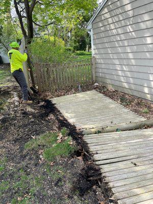 Demo of original rotted picket fence.