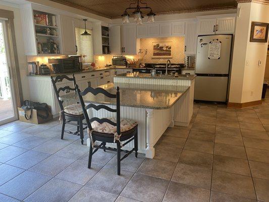 Clients clean kitchen