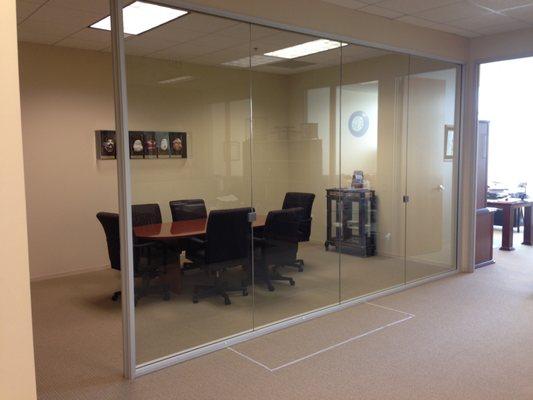 A view from our open office area into the conference room.