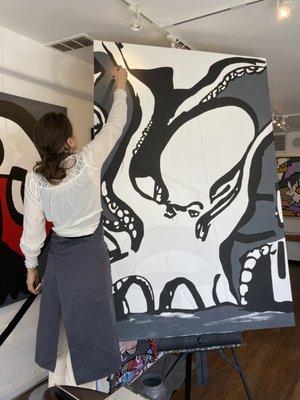 Mandy live painting "Mr. Casual" at the Gallery.