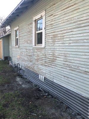 same house 
 scrape caulk, putty primer and paint all products at sherwin williams