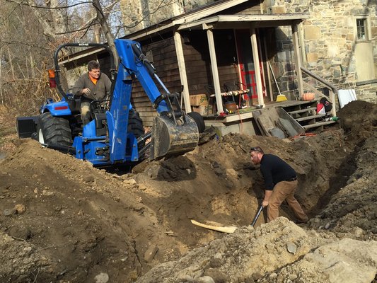 Installing a new underground waterline.