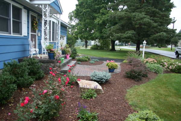 New paver walk and matching block stoop with plantings