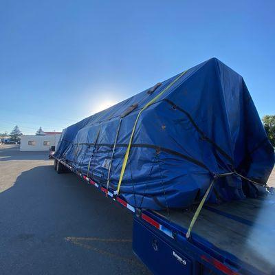 Tarped load is ALWAYS on the menu for our customers.  We love weather, but don't invite it in.