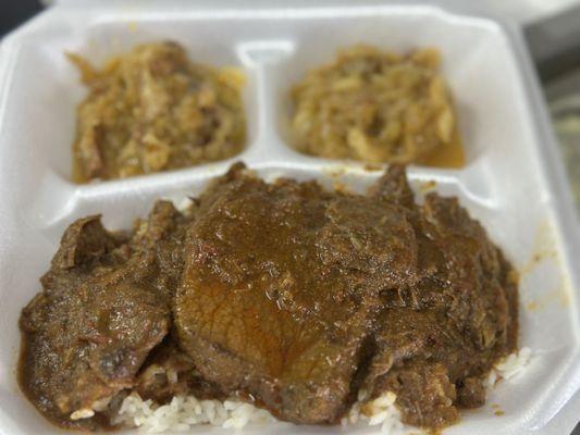 Daily plate lunch specials. Customers fav. Smothered steak with smothered cabbage.