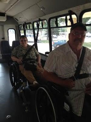 Passengers on a Handi-Wheels bus.