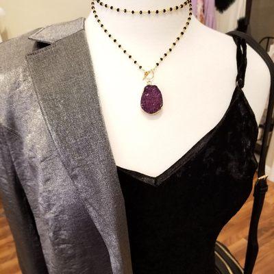 Inspiration Boutique and Gallery Stone and chrystalized jewelry to match a sleek black dress.