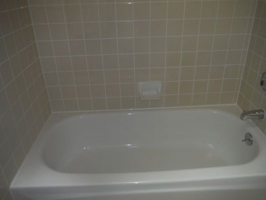 After is like a new tub/shower at our rental.