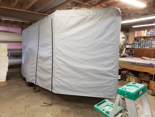 A full cover for a motorcycle trailer.