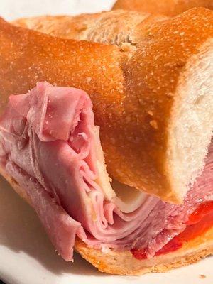 12. Italian Hero-Cappo Sandwich. Soppresatta, mortadella, salami, provolone, & roasted red peppers.  $14.95 + tax + tip