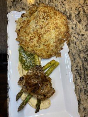 Steak and latkes hummus asparagus and chimmi churri with grilled onions