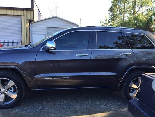 2014 Jeep Grand Cherokee with SolarGard Supreme 15%. Matches the back perfect.