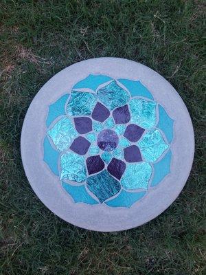 ZEN garden medallion stepping stone in aquas and violet... this glass changes color depending on the direction you are viewing.