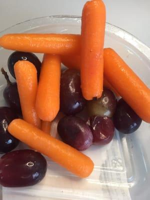 Slimy carrots and spoiled grapes I purchased in the morning for lunch but was unable to eat.