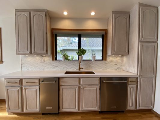 Countertop and backsplash complete renovation. From demolition, to prep and template to installation.