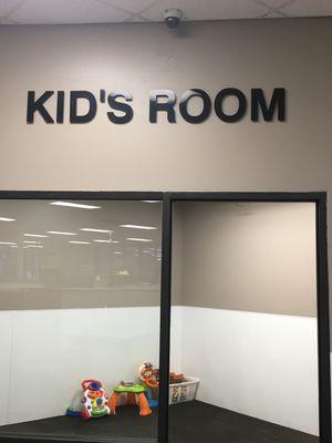 Kids room with toys for your little ones and a TV for cartoons