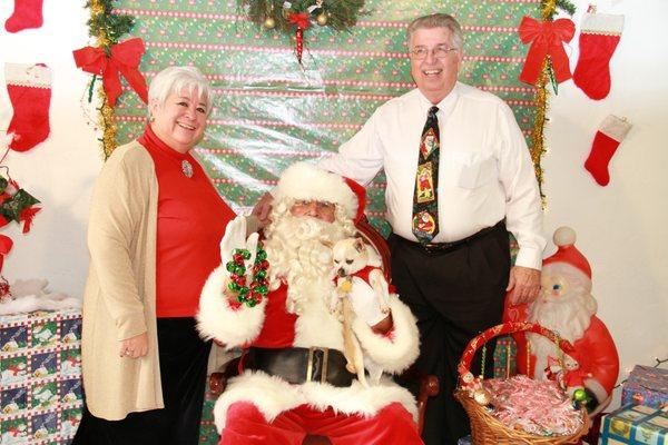 Santa dropped by the office to visit Gary & Amalia