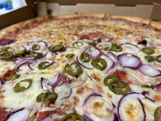 XL Cheese pizza with jalapeños/onions on one half