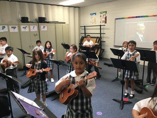 All grades participate in weekly Music classes. Students are taught about music theory, use of band instruments and learn songs.