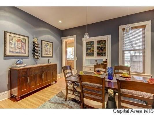 Beautiful Dining room with wood floors and built-in hutch