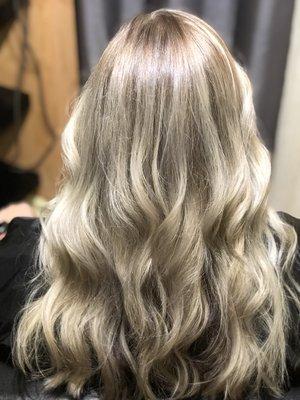 Dimensional beige, and cool blonde creating a creamy blonde appearance