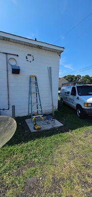 Installation of a package unit to a block wall