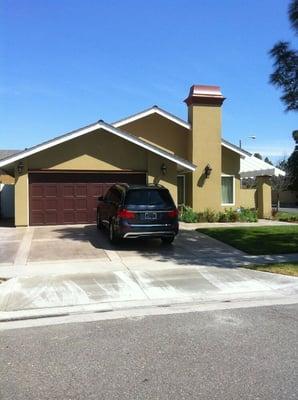 Wood siding replaced with smooth stucco.