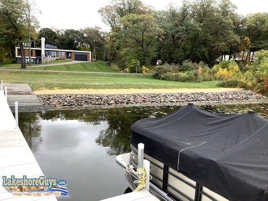 Concrete boat ramp and riprap shoreline - dock view