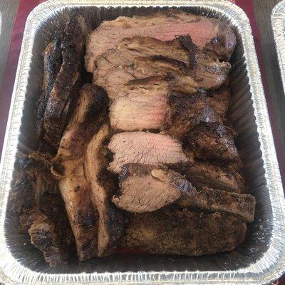 The dry-rubbed tri-tip!  9 lbs of the most delicious, moist and flavorful main course!