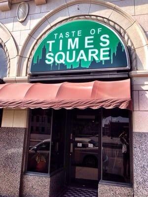 Taste of Times Square is  just off the lobby of the Petroleum Building at 217 S. Broadway, a quick walk from anywhere downtown.