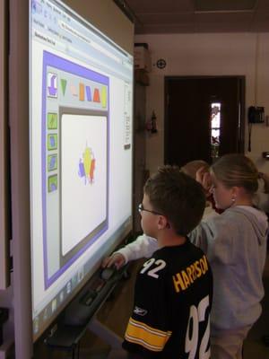 St. Patrick students using SmartBoard technology.