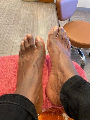 A picture of my feet after the Pedicure treatment. My feet feel soft and brand new. Every person should treat themselves to this service.