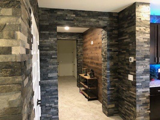 Hallway with wood accent wall