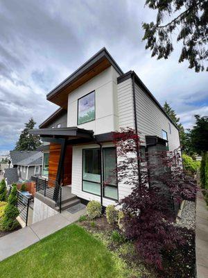 A new home's makeover in Kirkland, WA. Our residential exterior painting and staining project adds modern allure to this residence.